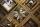 Portion of a large artwork consisting of objects set in cedar frames.